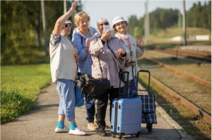 Four senior women from Boca Raton with their bags packed waiting for train